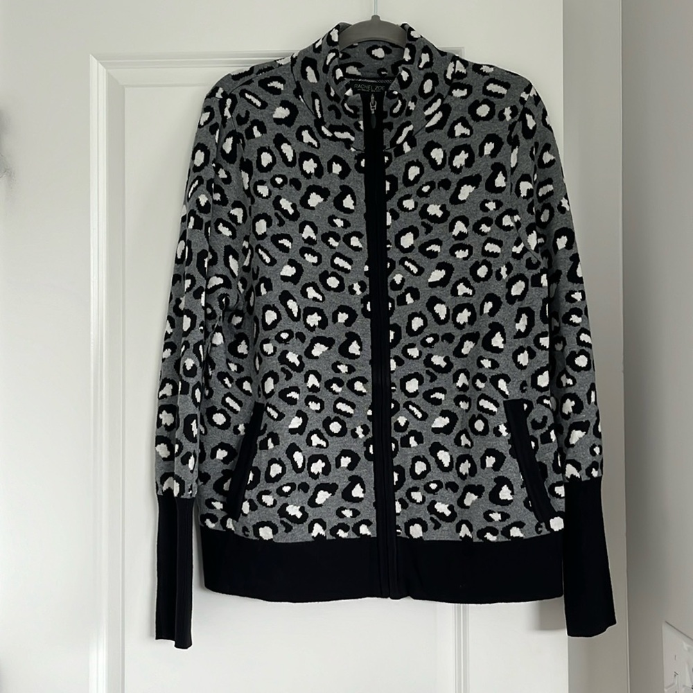 **SOLD**Animal print zip up sweater.